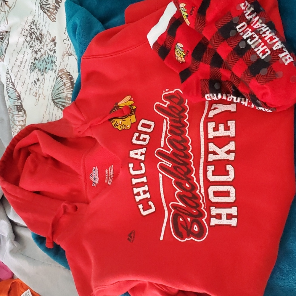 Chicago Black Hawk's sweatshirt and matching socks.